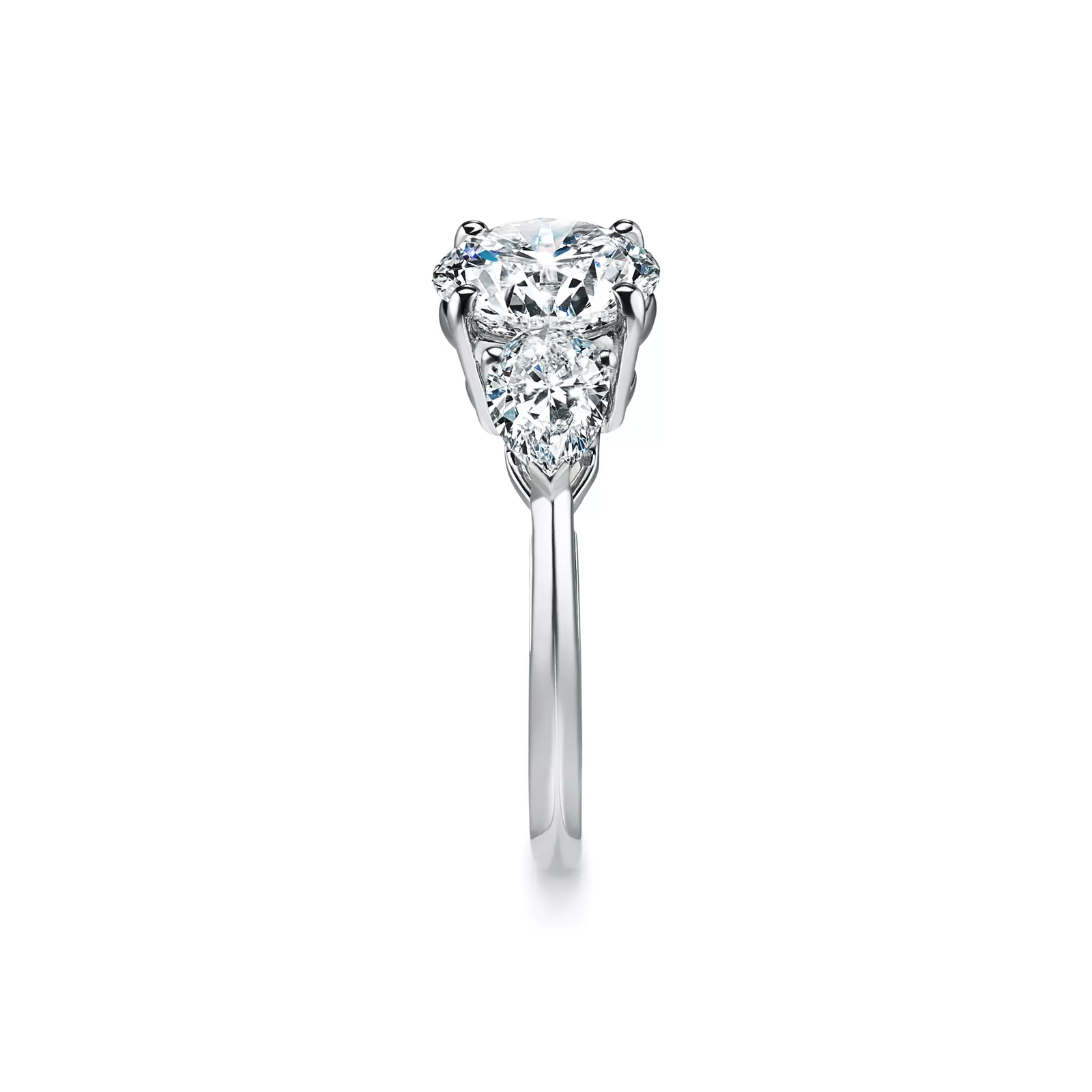Engagement Ring with Pear-shaped Side Stones in Platinum
