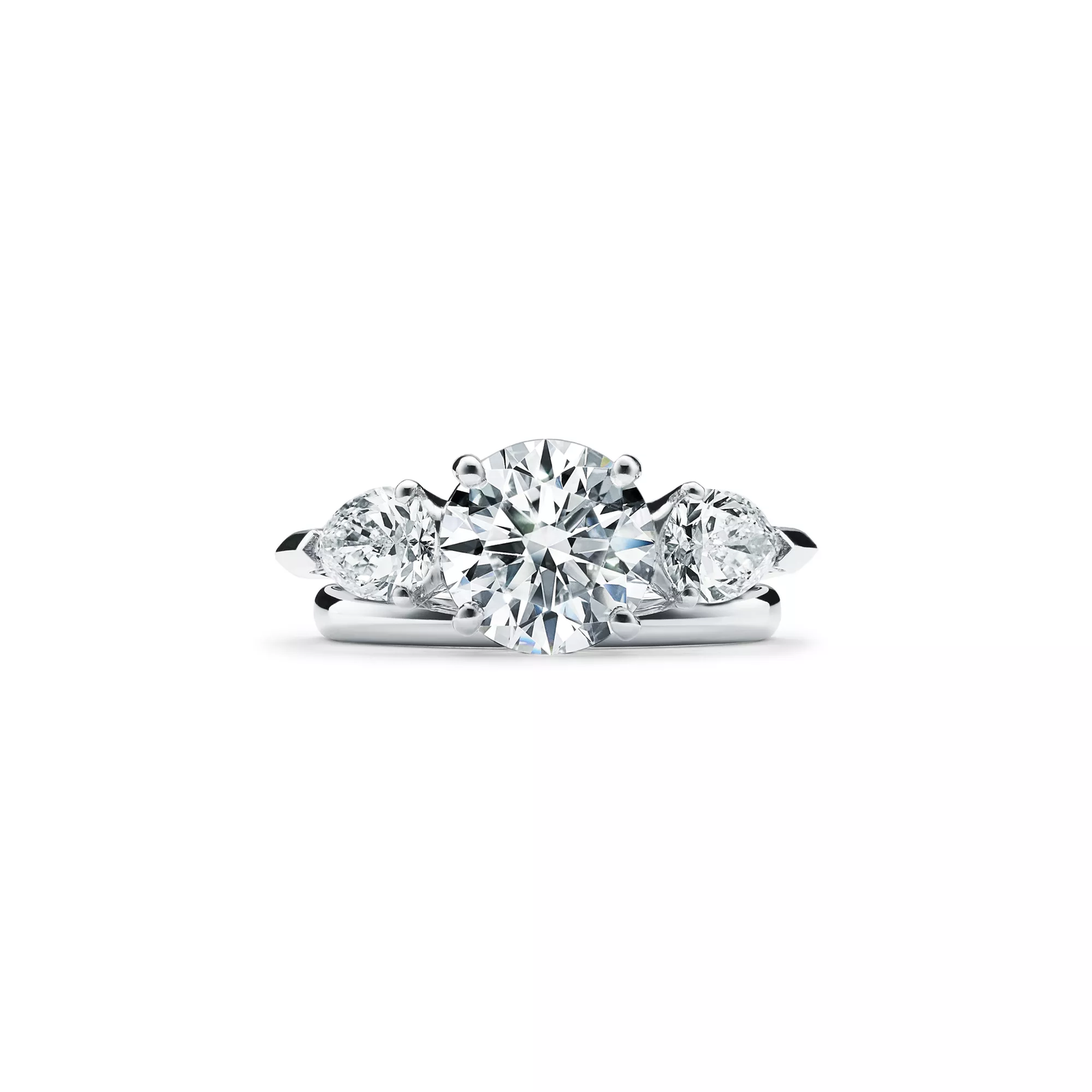 Engagement Ring with Pear-shaped Side Stones in Platinum