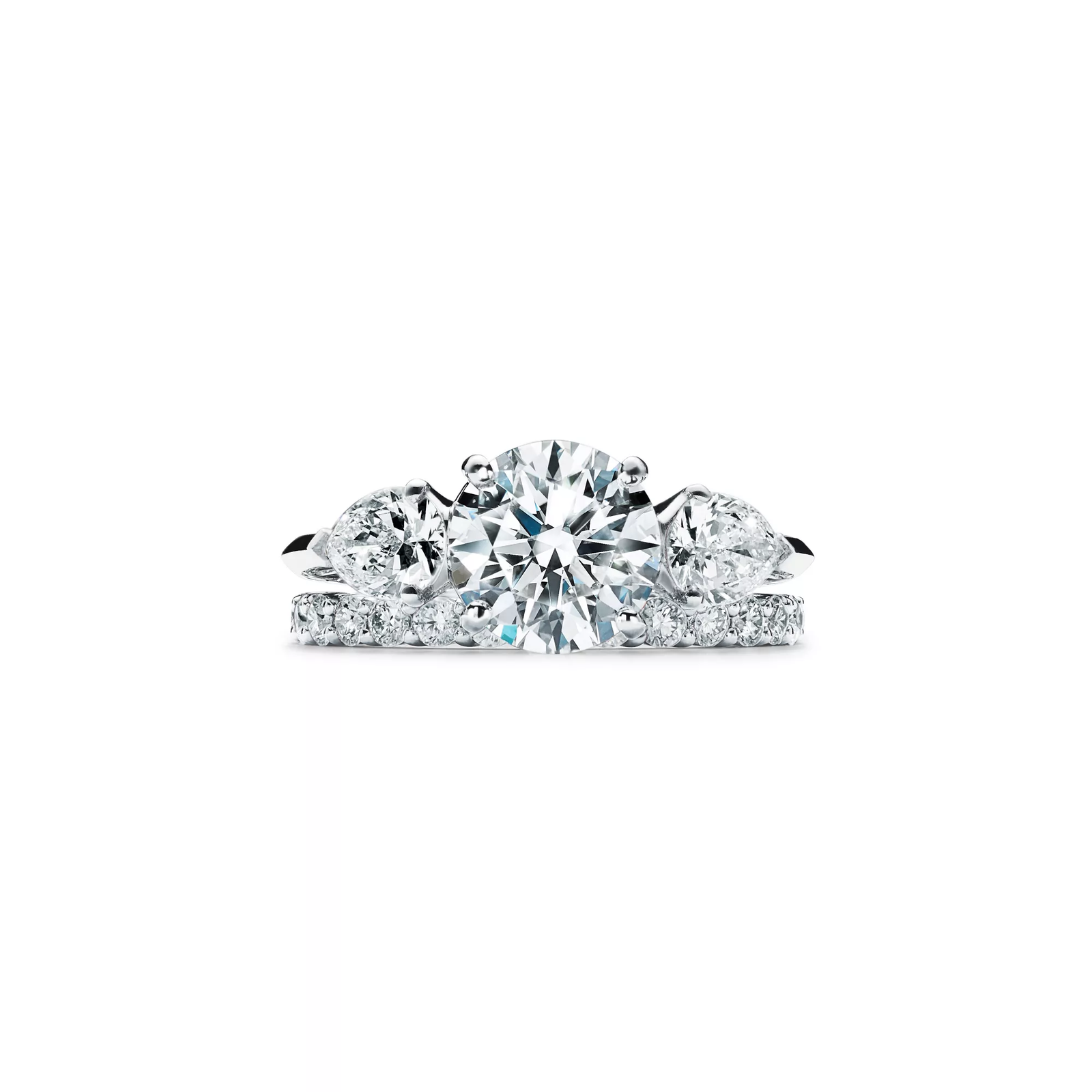 Engagement Ring with Pear-shaped Side Stones in Platinum
