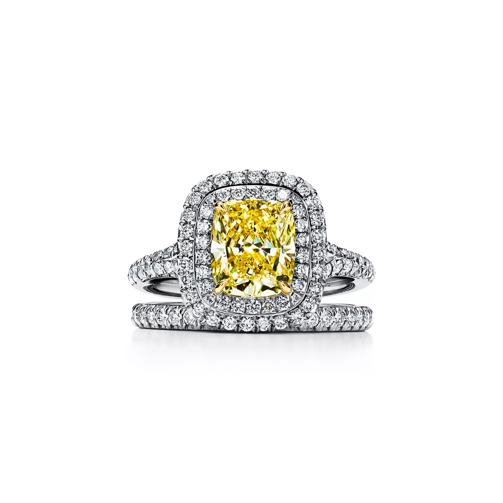 Cushion-cut Yellow Diamond Halo Engagement Ring in Platinum