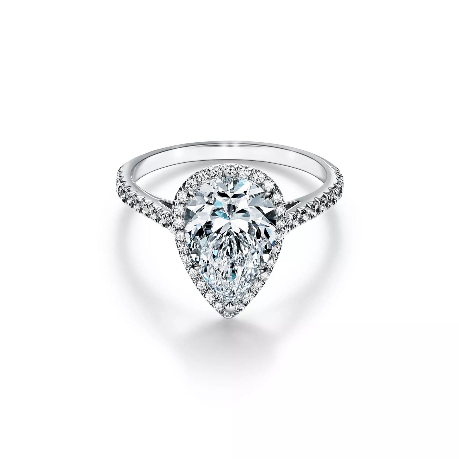 Pear-shaped Halo Engagement Ring with a Diamond Platinum Band