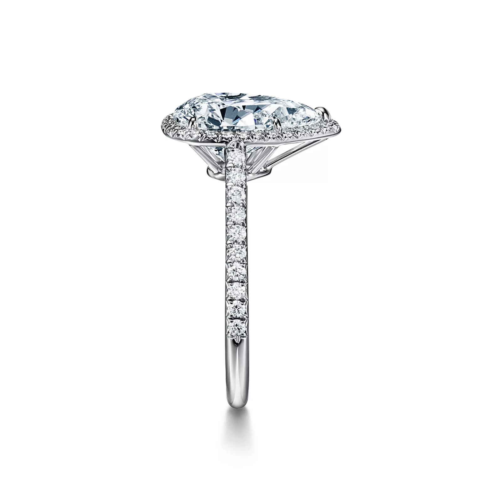 Pear-shaped Halo Engagement Ring with a Diamond Platinum Band
