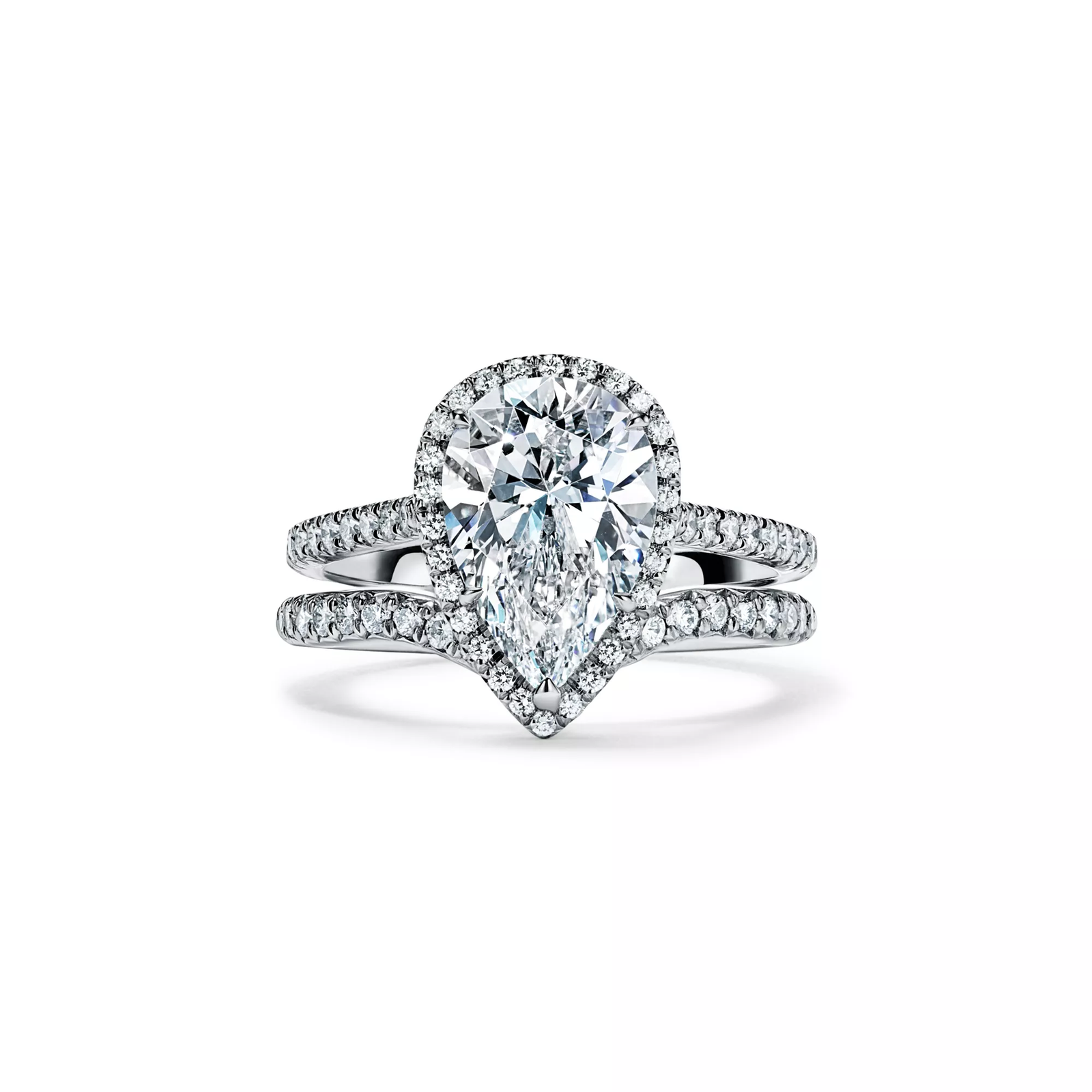 Pear-shaped Halo Engagement Ring with a Diamond Platinum Band