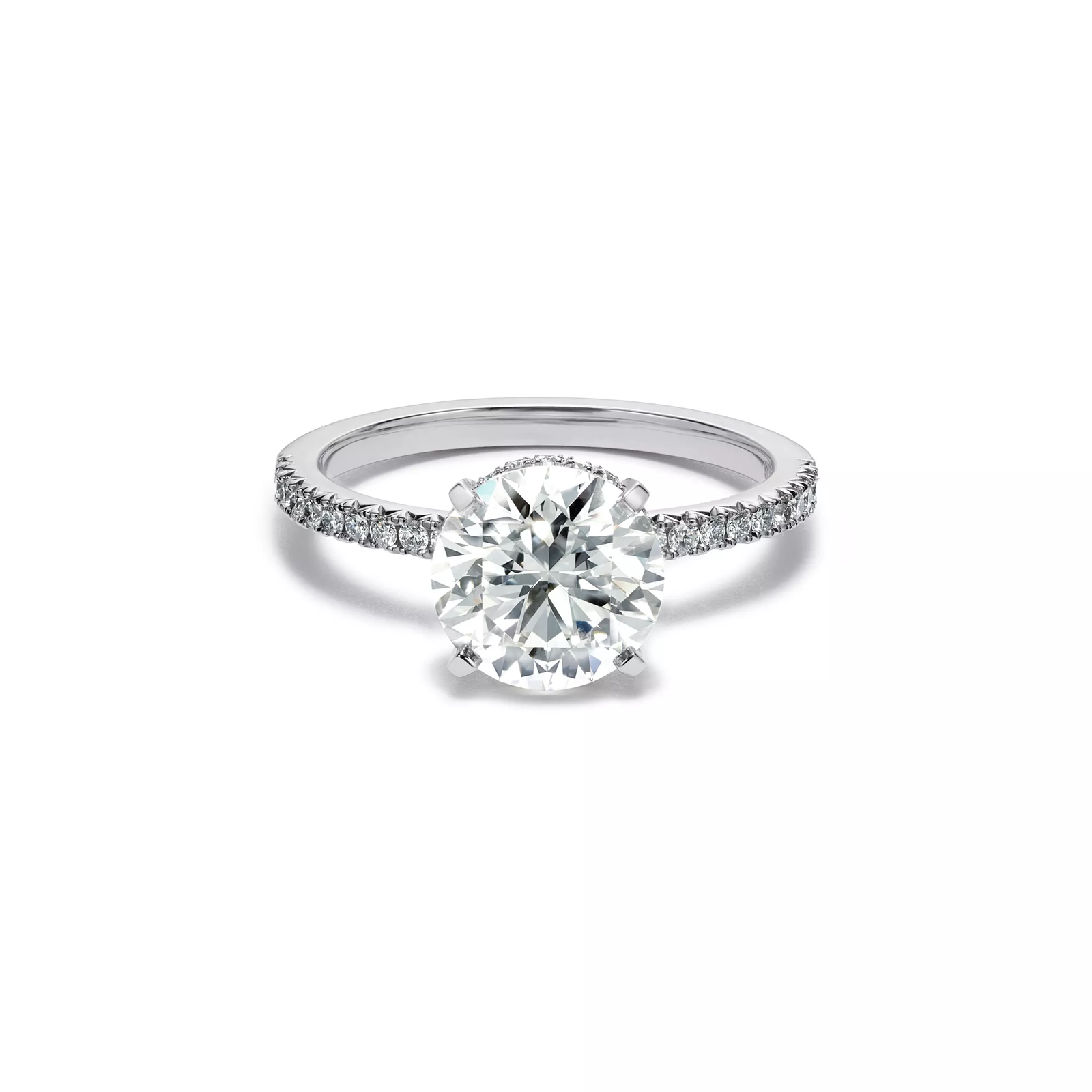 Engagement Ring with a Round Brilliant Diamond and a Platinum Diamond Band