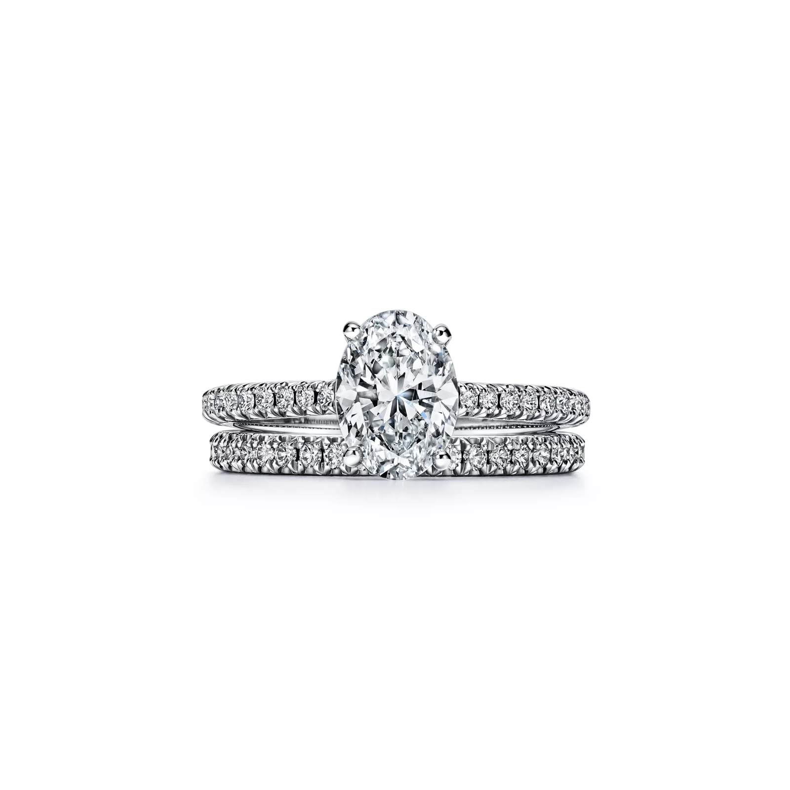 Oval Brilliant Engagement Ring with a Pave Diamond Band in Platinum