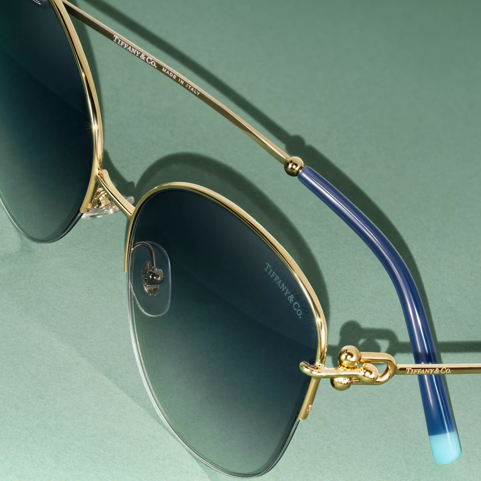 Sunglasses in Pale Gold-colored Metal with Blue Lenses