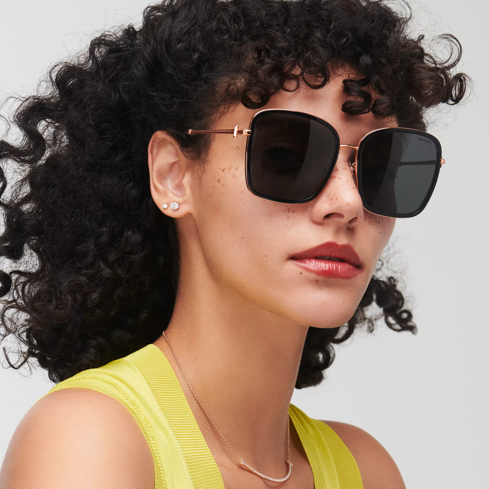 Sunglasses in Black on Rose Gold-colored Metal with Dark Gray Lenses