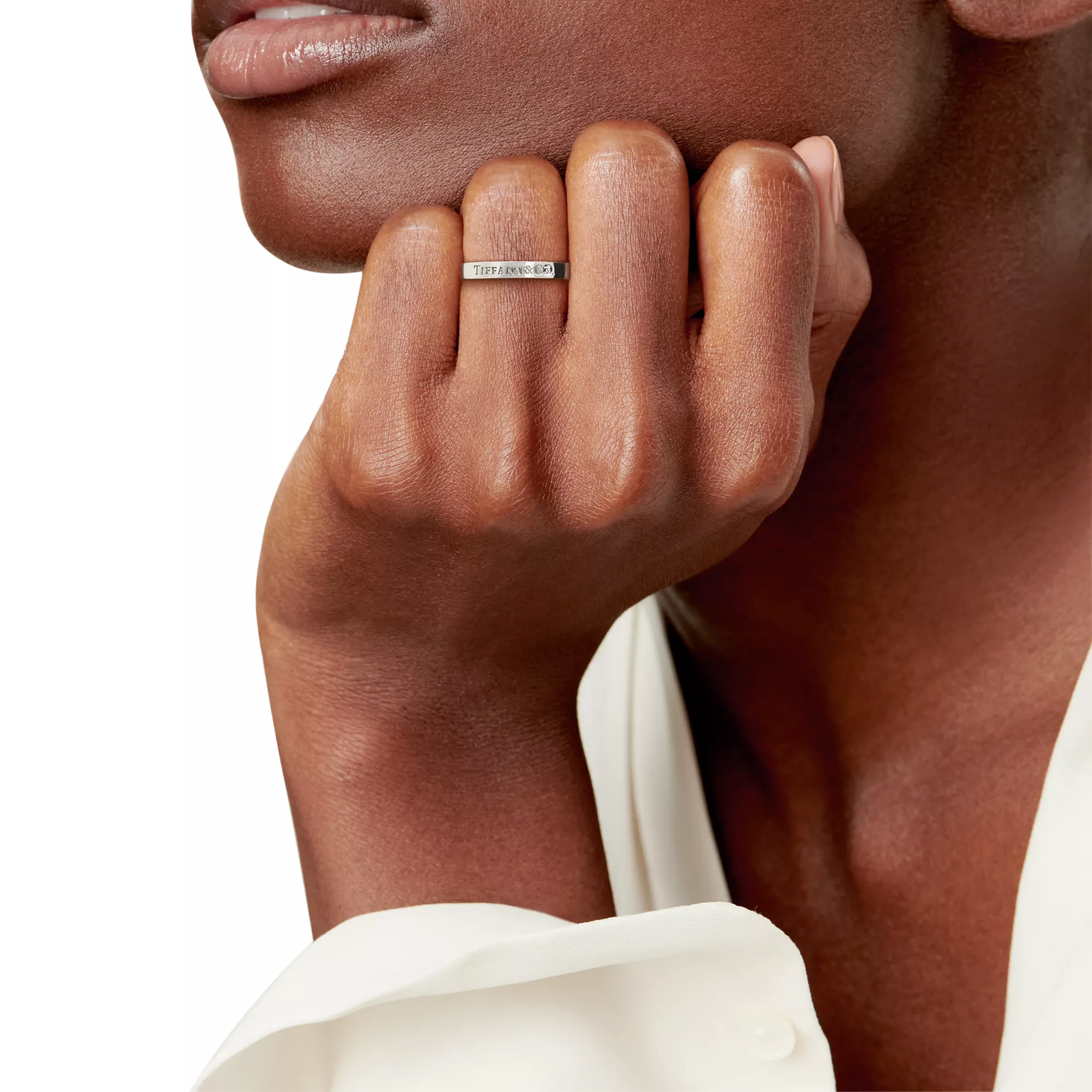 Band Ring in Platinum with a Diamond
