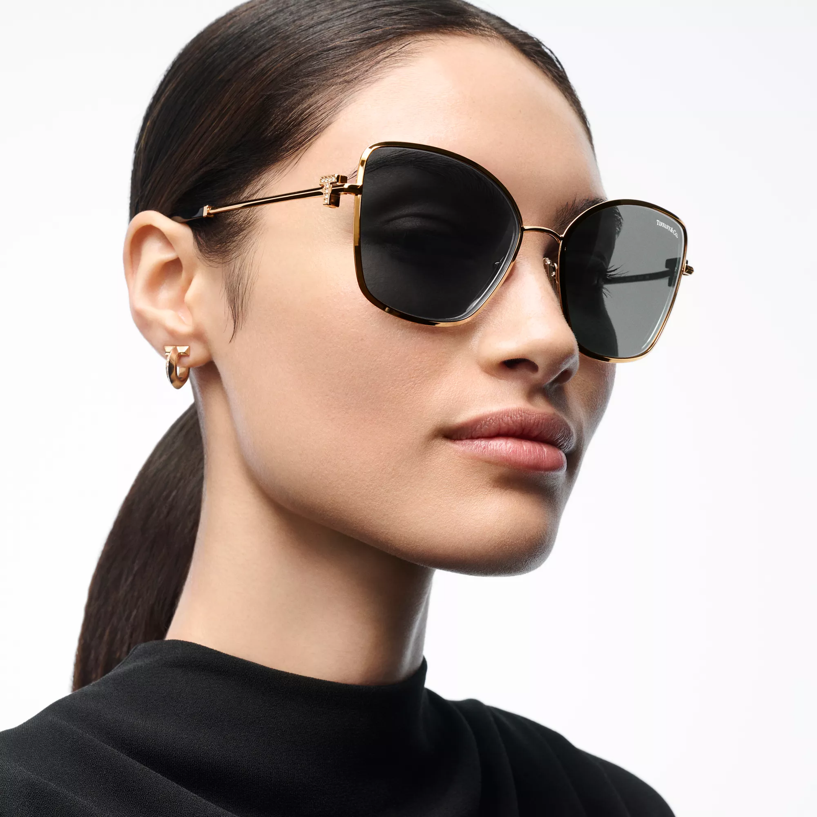 Sunglasses in Pale gold-colored Metal with Gray Gradient Lenses
