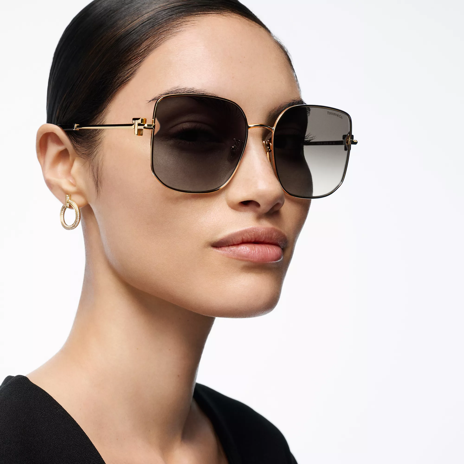 Sunglasses in Pale Gold-colored Metal with Gray Gradient Lenses