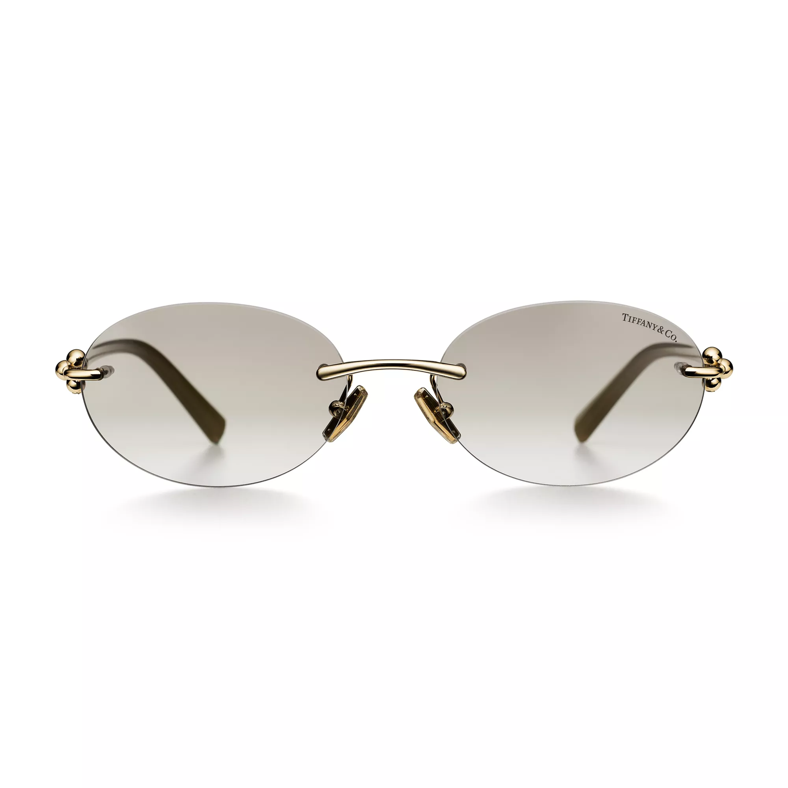 Sunglasses in Pale Gold-colored Metal