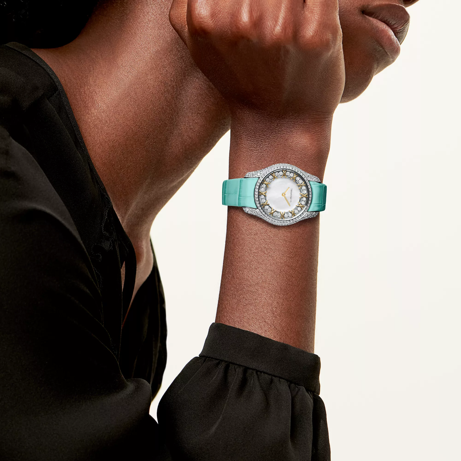 Watch in Gold with Diamonds.